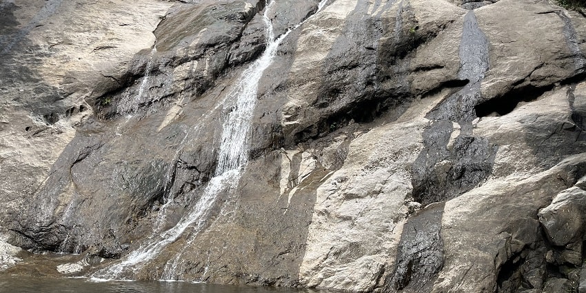 Thusharagiri Waterfalls, cascading falls amid rocky terrain - Kozhikode Waterfalls