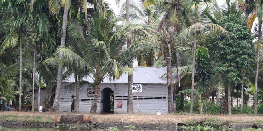 Picture of a small Toddy Shop surrounded by the Plam and Coconut trees in Kumarakom