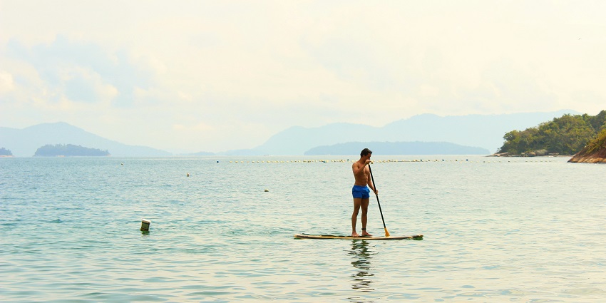 Stand-up paddleboarding is a relaxing water activity that can be done by everyone