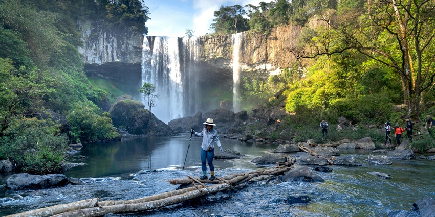 Person on an Adventure in the Forest with Waterfalls - pack essential items for adventure