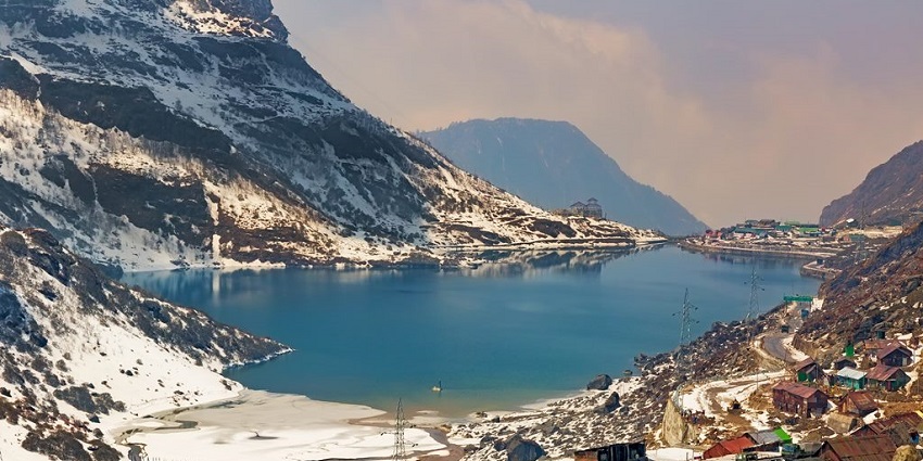 Enchanting view of the Tsomgo lake encircled by snow covered hills of Eastern Himalayas