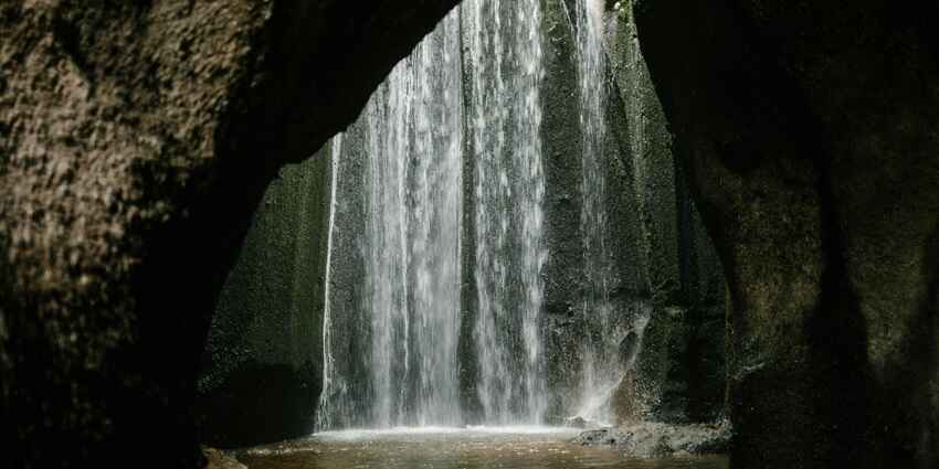 Tukad Cepung Falls, a cascading beauty leaves a stunning visual impact on visitors.