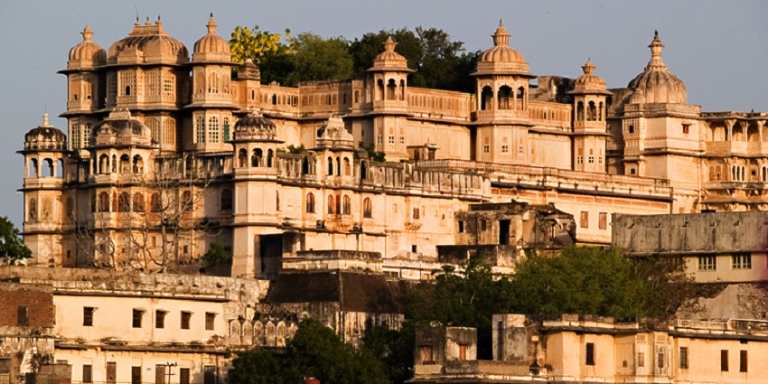 Beautiful Udaipur cityscape with historic palaces - places to visit in monsoon in India