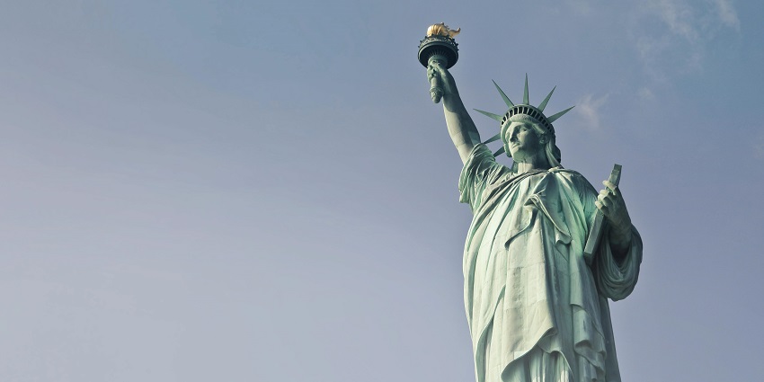 A daytime view of the Statue of Liberty, one of the famous tourist attractions in the USA