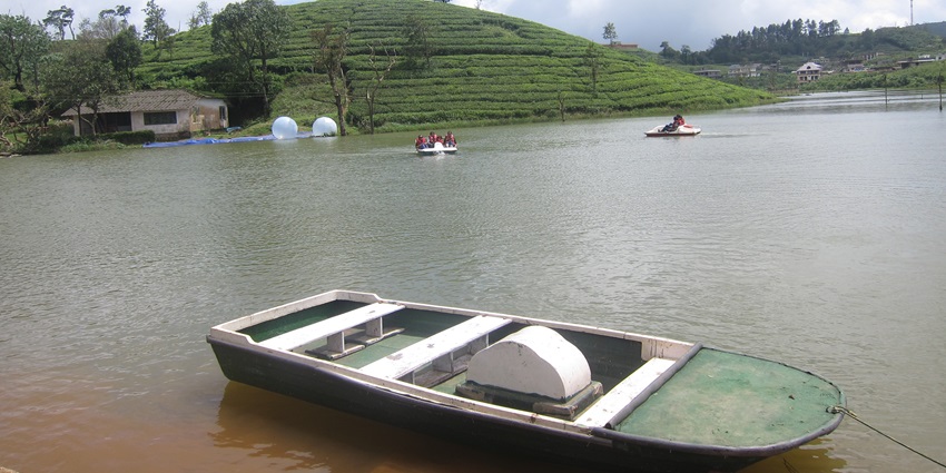 glimpse of the scenic Vagamon Lake, a tourist spot near Vagamon Adventure Park.