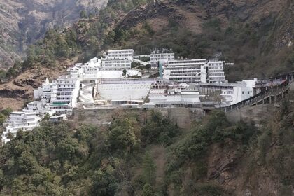 A view of Bhawan at the sacred Vaishno Devi Temple surrounded by mountains and trees