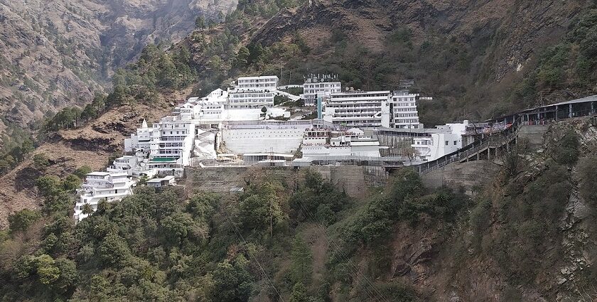 A view of Bhawan at the sacred Vaishno Devi Temple surrounded by mountains and trees