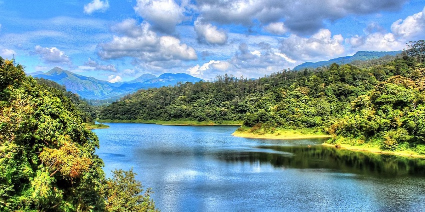 Unwind at the serene Valparai Lake, one of the hill stations near Palakkad, Kerala.