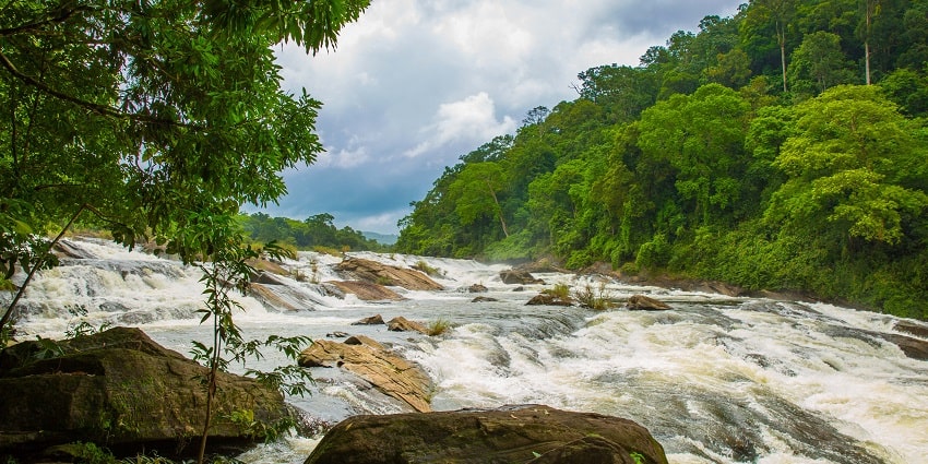 The full flowing Vazhachal Falls on the upper reaches of Chalakudy River.