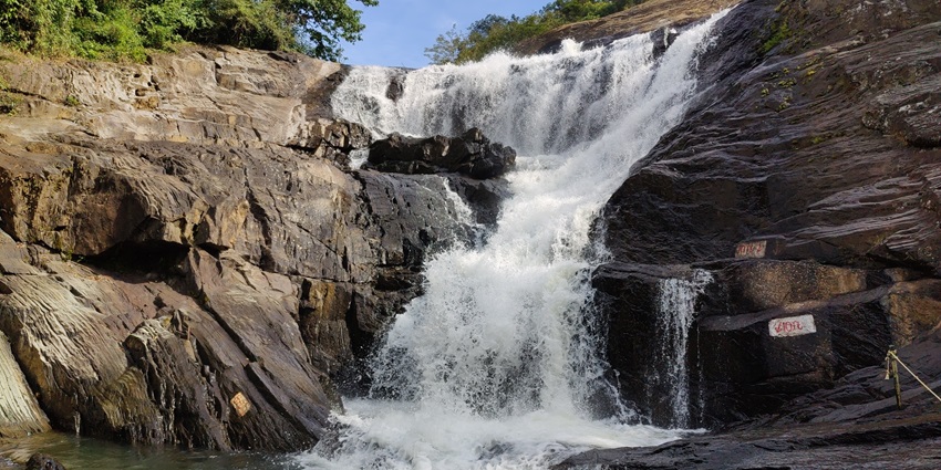 A breathtaking view of a waterfall in Kerala, which is one of the must-visit destinations.