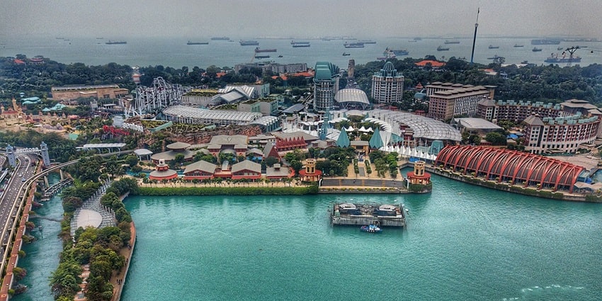 Aerial perspective of Sentosa Island with clear blue water - Islands near Singapore