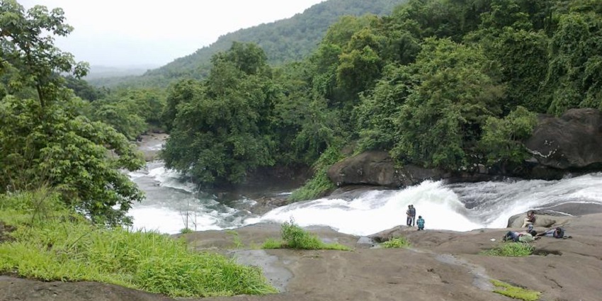 Enjoy a stroll along the cascading Adyanpara Falls while exploring Nilambur, Kerala.