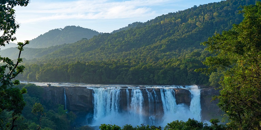 The cascading Athirapally Waterfalls are the best places to visit in Chalakudy, Kerala.