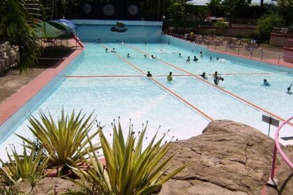 Silver Strome water park, people are playing & enjoying in the pool -Theme parks in Kerala