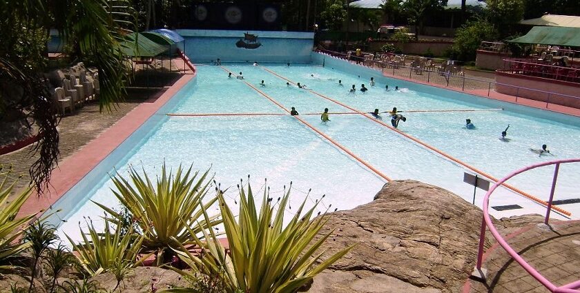 Silver Strome water park, people are playing & enjoying in the pool -Theme parks in Kerala