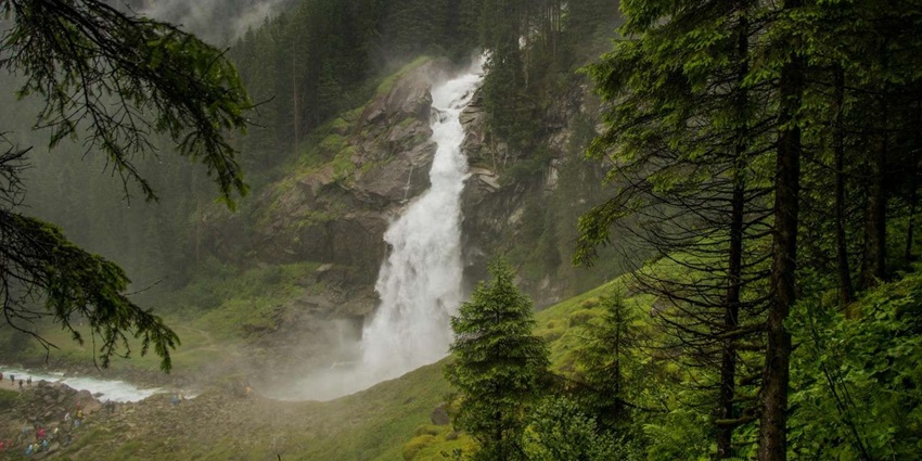 Scenic Snapshot of the beautiful waterfall descending among the trees–Adyanpara Waterfalls