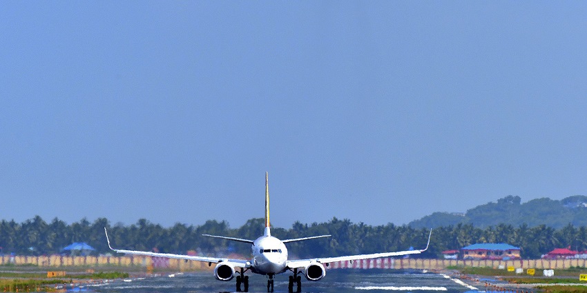 A picture of an aeroplane landing at the Trivandrum International Airport in Kerala