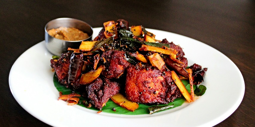 Relish the famous cuisines on your trip to Athirapally Waterfalls in Kerala, India.