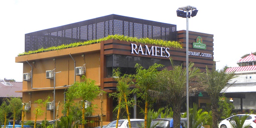 A picture of a restaurant in Kerala taken from across the street