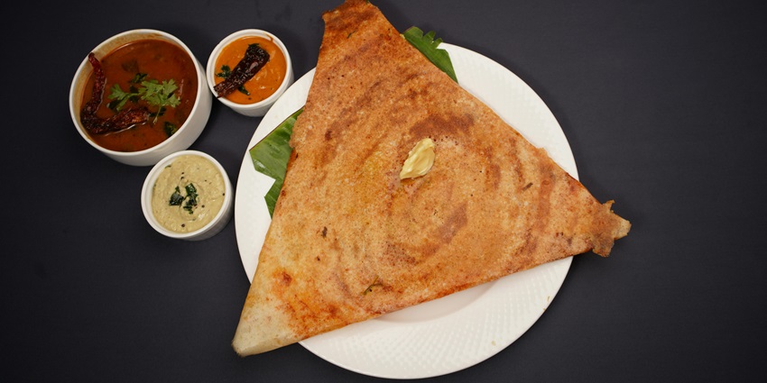A dosa plate served at a local eatery nearby, offering authentic Kerala cuisine