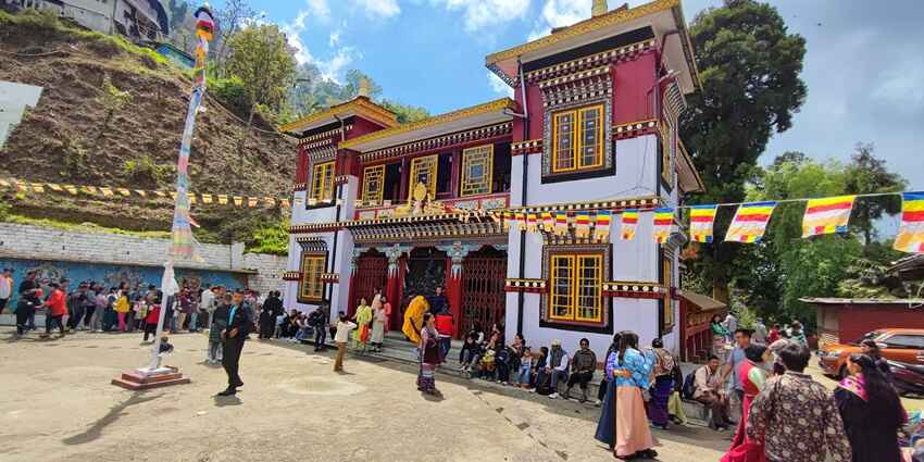 People gathered around a monastery in Darjeeling