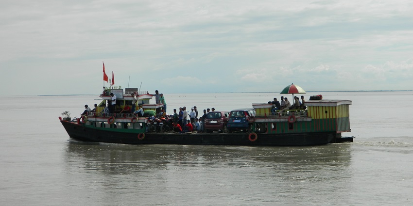 A ferry crossing the Brahmaputra River on its way - places to visit in Dibrugarh