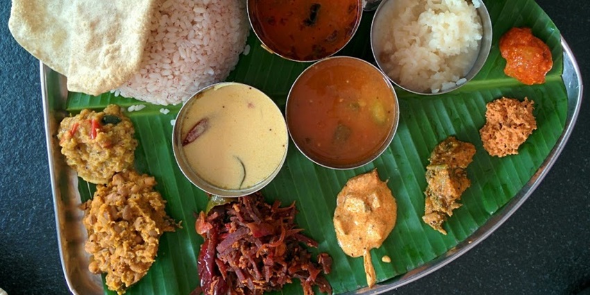 Cherish some delicious local cuisines after visiting the Malanada Temple in Kerala.