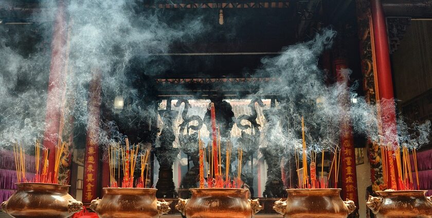 An image of incest sticks burning at one of the sacred temples located in Vietnam.