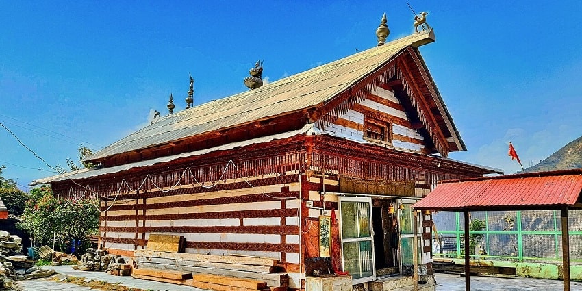 This temple nestled amidst nature's embrace offers refreshing retreat with the views of Shivalik hills
