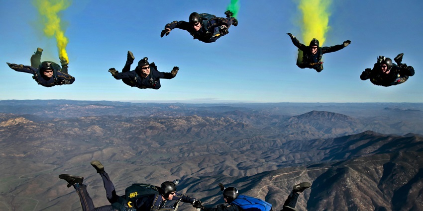 Group of skydiver taking the beautiful jumps to form a formation in the sky in Singapore