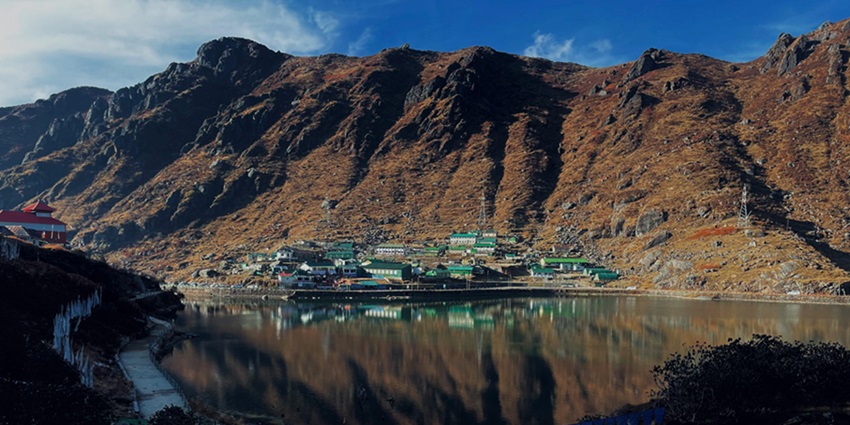 Panoramic Snapshot of the beautiful greenhouses on the shores of the Mountain Lake