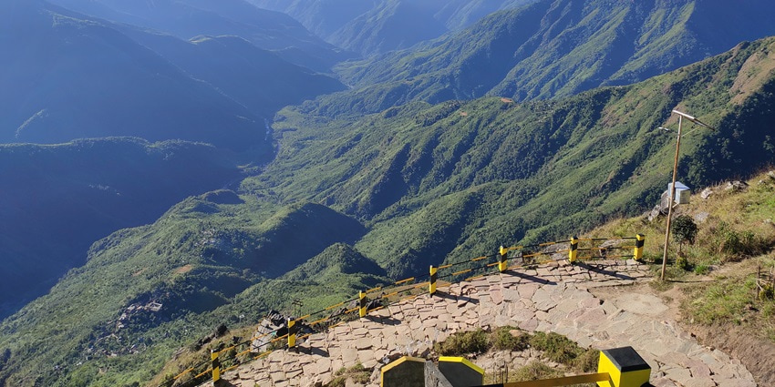 Panoramic view of Laitlum Canyon in Meghalaya, showcasing lush green hills–things to do in meghalaya