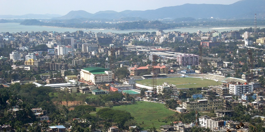 Image of panoramic view of Guwahati city showcasing its skyline and lush green hills