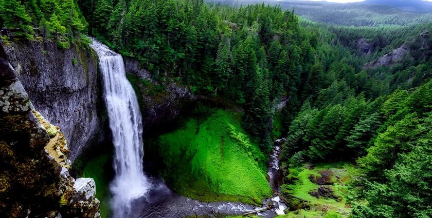 Landscape of waterfalls in Nagaland cascading rocky cliffs, surrounded by lush forests.