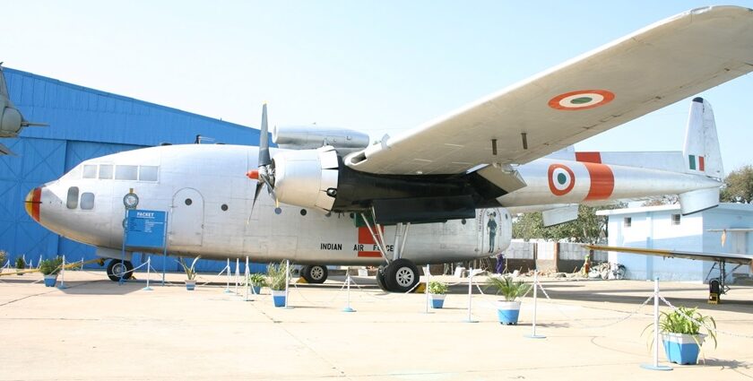 A mesmerising view of an aeroplane with red circles on its wings during the daytime.