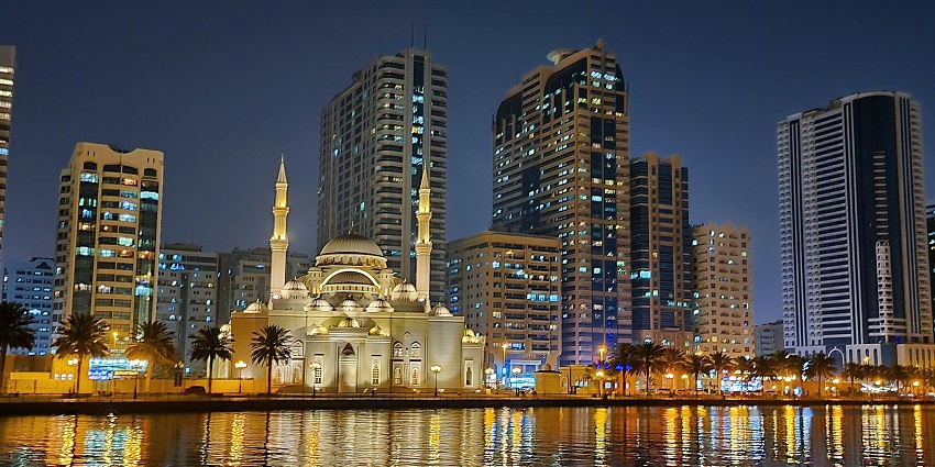 A nighttime view of the Al Noor Mosque, a sacred tourist destination of the region.