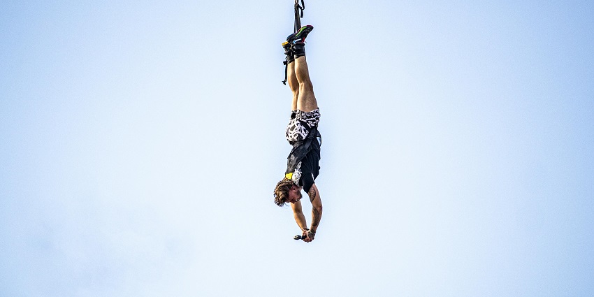 Image of a person participating in the bungee jumping event held on the tower.