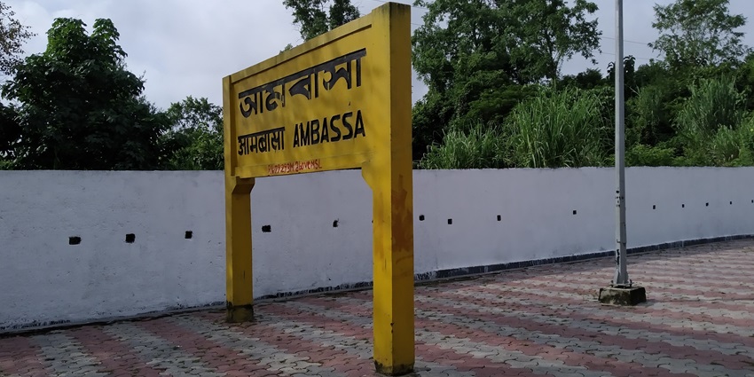 Sign of Ambassa Railway Station while going to Tripureswari Temple, lush green surroundings.