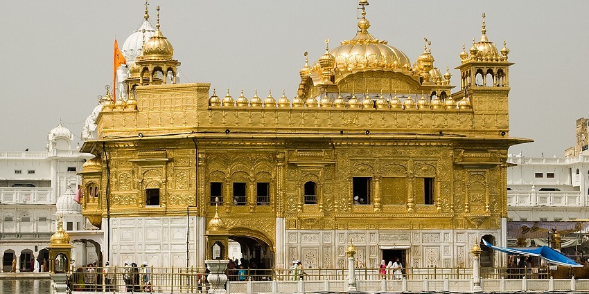 A picture of the holiest place for Sikhs, the Golden Temple during day time
