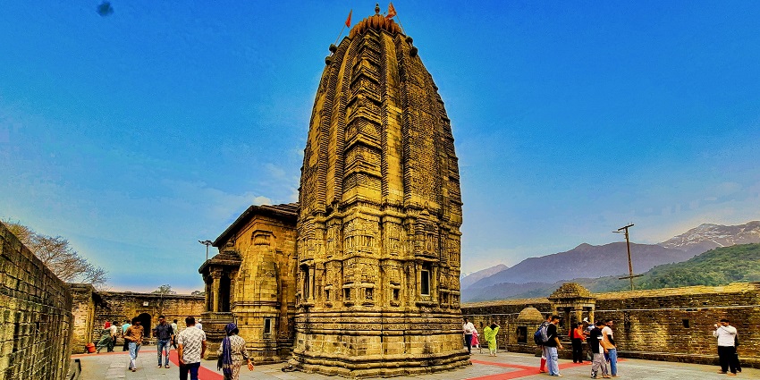 Ancient Baijnath temple in Himachal Pradesh, showcasing intricate stone carvings.