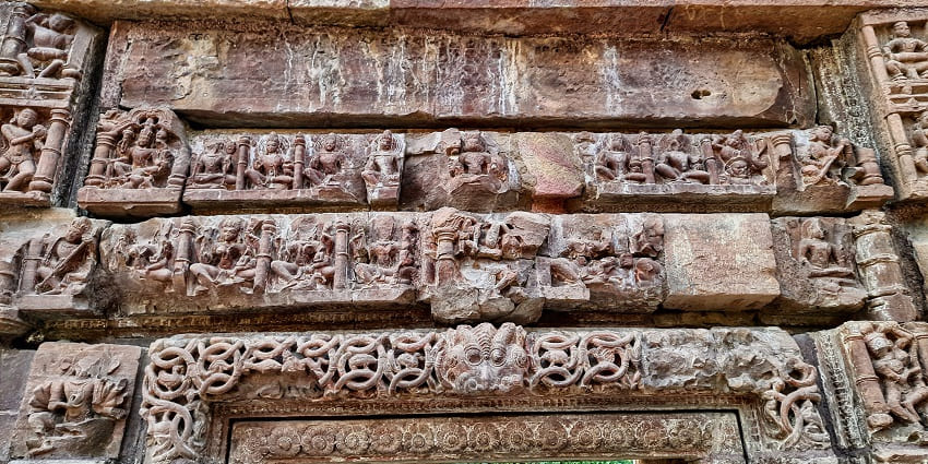 Ancient architecture featuring intricately carved stone structures - Badarpur Fort.