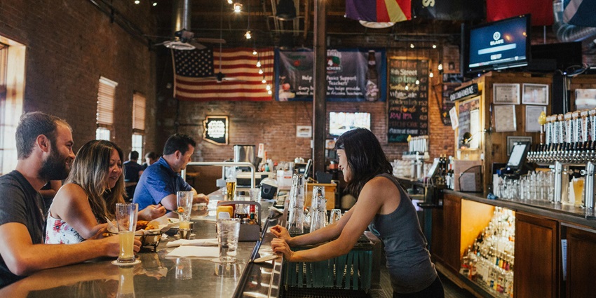 People having drinks at a bar