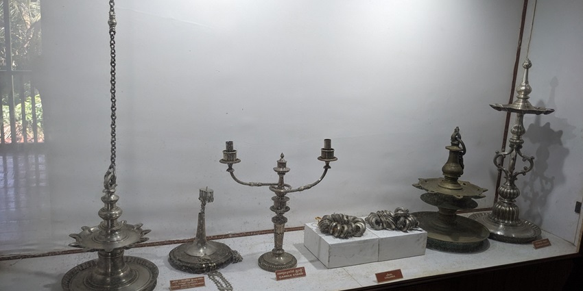 Historical artefacts displayed at the Arakkal museum, one of the must see place near Thalassery fort