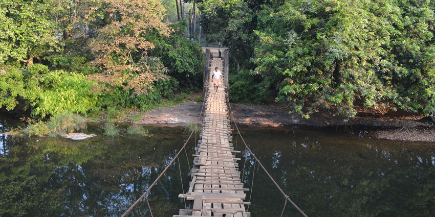 A bridge over serene waters of a lake offering a pleasing view worth capturing