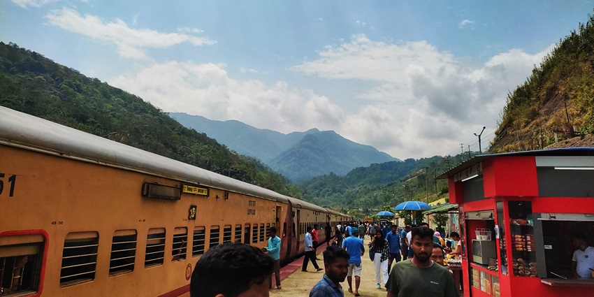 Scenic snapshot of the Assam Railway Station with the Himalayas in the background