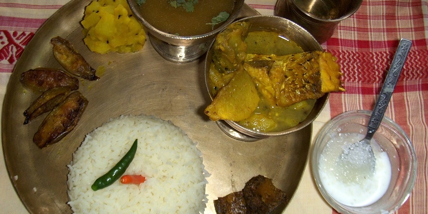 Assamese food is a major highlight enjoyed by tourists during their visit to Akashiganga waterfalls.