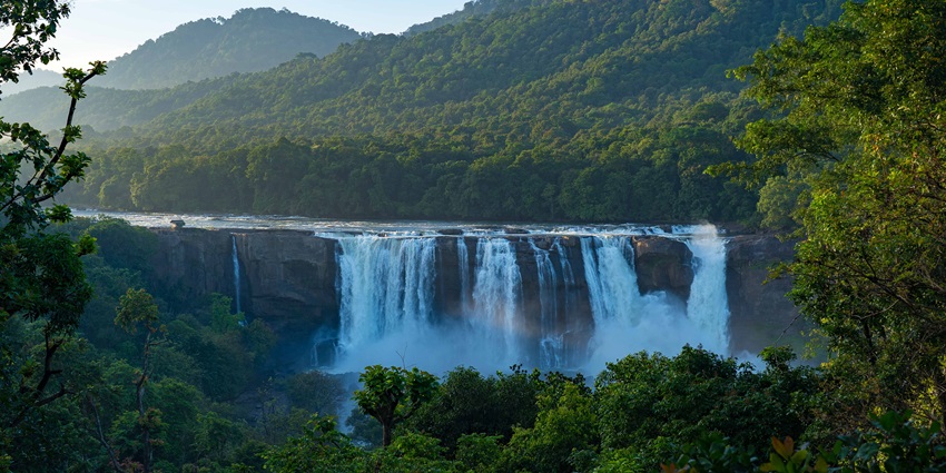 Athirapally Waterfalls is a scenic sight near the Pambummekkattu temple with cascading streams