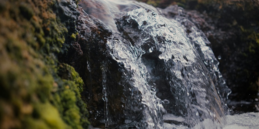 A serene view of the Attukad Waterfall, a scenic hotspot near Ripple Waterfalls.