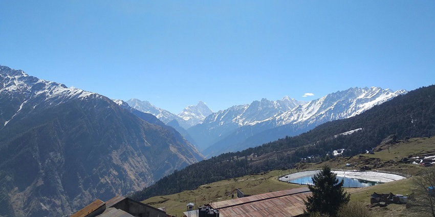 View of Auli, showcasing snow-capped mountains - One of the budget hill stations near Delhi.