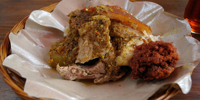 A picture of a traditional Bali dish served in a wooden basket at a restaurant